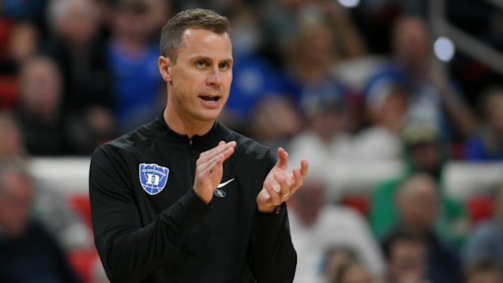 Mar 21, 2025; Raleigh, NC, USA; Duke Blue Devils head coach Jon Scheyer reacts during the second half against the Mount St. Mary's Mountaineers in the first round of the NCAA Tournament at Lenovo Center. Mandatory Credit: Zachary Taft-Imagn Images