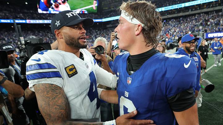 Dallas Cowboys quarterback Dak Prescott (4) speaks with New York Giants quarterback Jaxson Dart (6) after the game at MetLife Stadium. Dallas Cowboys quarterback Dak Prescott (4) speaks with New York Giants quarterback Jaxson Dart (6) after the game at MetLife Stadium.