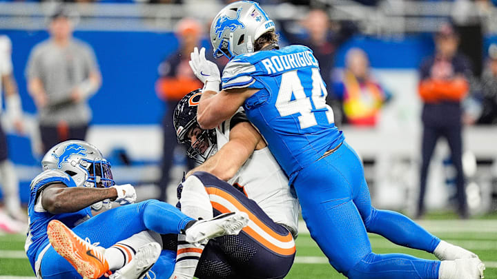 Lions linebacker Malcolm Rodriguez tackles Bears tight end Cole Kmet. After a 2024 ACL tear, Rodriguez is a free agent at a position where the Bears could need help.