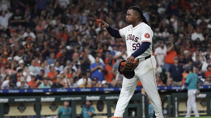 Sep 24, 2024; Houston, Texas, USA; Houston Astros starting pitcher Framber Valdez (59) points to the dugout after he was taken out in the sixth inning against the Seattle Mariners at Minute Maid Park. Sep 24, 2024; Houston, Texas, USA; Houston Astros starting pitcher Framber Valdez (59) points to the dugout after he was taken out in the sixth inning against the Seattle Mariners at Minute Maid Park.