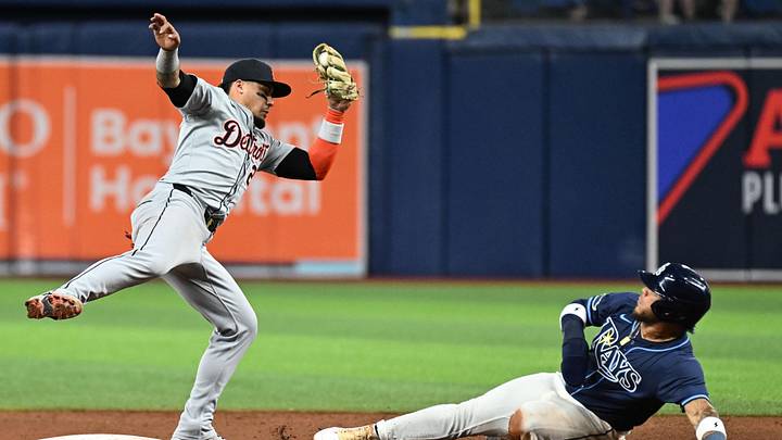 Apr 23, 2024; St. Petersburg, Florida, USA; Detroit Tigers shortstop Javier Baez (28) prepares to tag out Tampa Bay Rays designated hitter Harold Ramirez (43) in the sixth inning at Tropicana Field. Mandatory Credit: Jonathan Dyer-Imagn Images