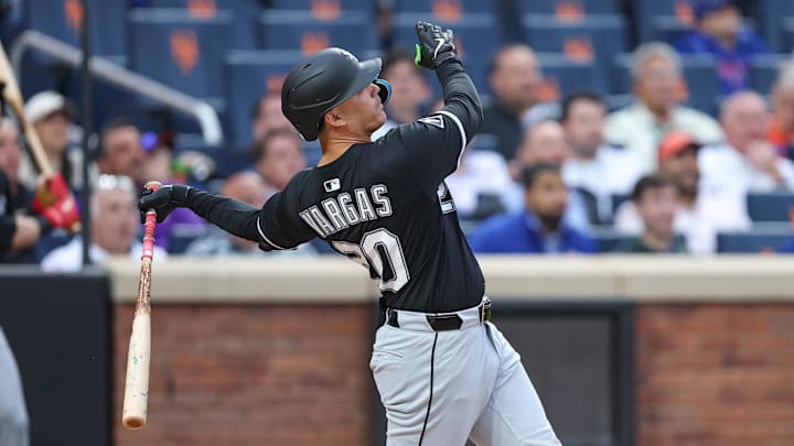 Chicago White Sox third baseman Miguel Vargas (20) hits a two-run home run against the New York Mets at Citi Field. Chicago White Sox third baseman Miguel Vargas (20) hits a two-run home run against the New York Mets at Citi Field.