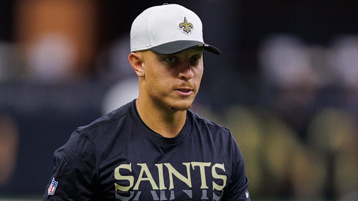 Aug 23, 2025; New Orleans, Louisiana, USA; New Orleans Saints quarterback Spencer Rattler (2) looks on during warmups at Caesars Superdome. Mandatory Credit: Stephen Lew-Imagn Images