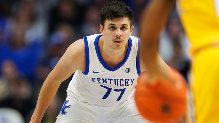 Nov 19, 2024; Lexington, Kentucky, USA; Kentucky Wildcats guard Kerr Kriisa (77) gets set on defense during the second half against the Lipscomb Bisons at Rupp Arena at Central Bank Center. Mandatory Credit: Jordan Prather-Imagn Images