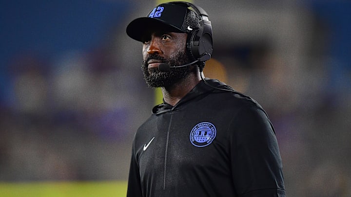 Aug 30, 2025; Pasadena, California, USA; UCLA Bruins head coach DeShaun Foster watches game action against the Utah Utes during the second half at Rose Bowl. Mandatory Credit: Gary A. Vasquez-Imagn Images