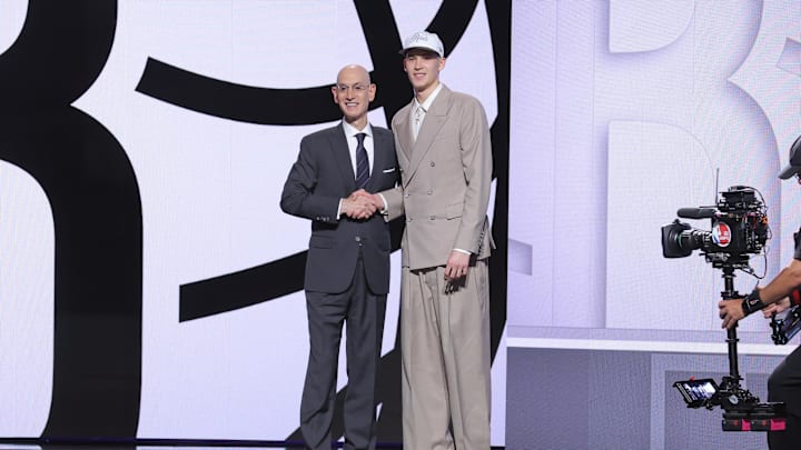 Jun 25, 2025; Brooklyn, NY, USA; Egor Demin stands with NBA commissioner Adam Silver after being selected as the eighth pick by the Brooklyn Nets in the first round of the 2025 NBA Draft at Barclays Center. Mandatory Credit: Brad Penner-Imagn Images Jun 25, 2025; Brooklyn, NY, USA; Egor Demin stands with NBA commissioner Adam Silver after being selected as the eighth pick by the Brooklyn Nets in the first round of the 2025 NBA Draft at Barclays Center. Mandatory Credit: Brad Penner-Imagn Images