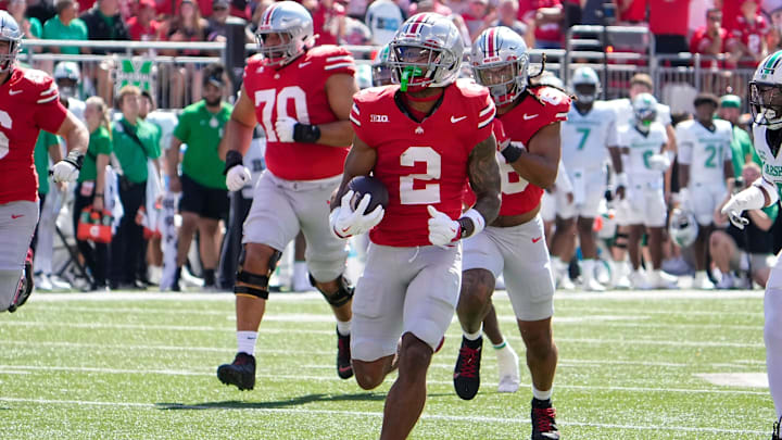 Ohio State receiver Emeka Egbuka runs for a touchdown against Marshall. Ohio State receiver Emeka Egbuka runs for a touchdown against Marshall.