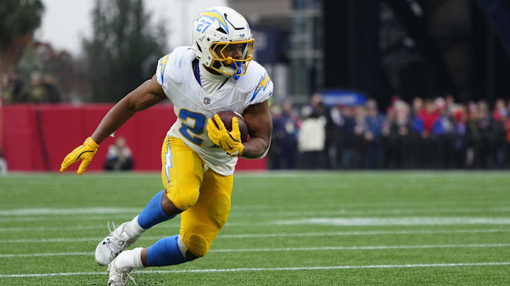 Los Angeles Chargers running back J.K. Dobbins runs with the ball against the New England Patriots.