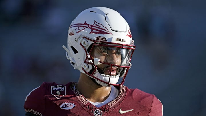 Sep 21, 2024; Tallahassee, Florida, USA; Florida State Seminoles quarterback DJ Uiagalelei (4) warms up before a game against the California Golden Bears at Doak S. Campbell Stadium. Mandatory Credit: Melina Myers-Imagn Images