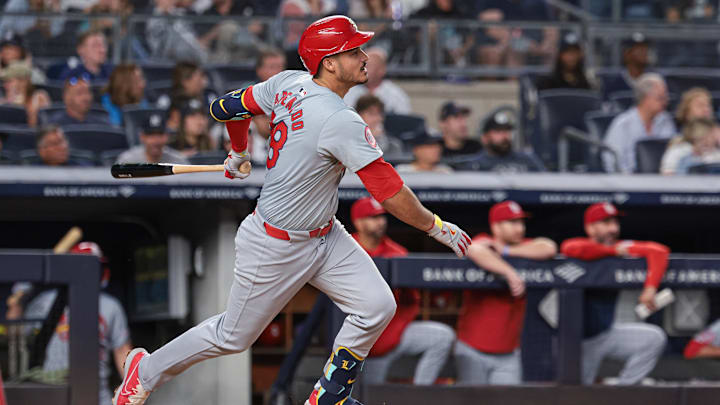Aug 30, 2024; Bronx, New York, USA; St. Louis Cardinals third baseman Nolan Arenado (28) singles during the third inning against the New York Yankees at Yankee Stadium. Mandatory Credit: Vincent Carchietta-Imagn Images