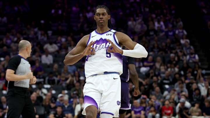 Mar 15, 2026; Sacramento, California, USA; Utah Jazz forward Cody Williams (5) reacts towards his bench after making a three-point basket against the Sacramento Kings during the fourth quarter at Golden 1 Center. Mandatory Credit: Dennis Lee-Imagn Images