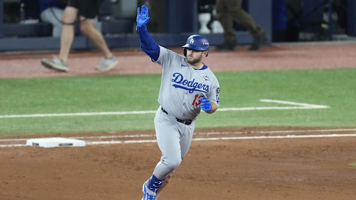 Nov 1, 2025; Toronto, Ontario, CAN; Los Angeles Dodgers third baseman Max Muncy (13) runs after hitting a home run against the Toronto Blue Jays in the eighth inning during game seven of the 2025 MLB World Series at Rogers Centre. Mandatory Credit: Kevin Sousa-Imagn Images Nov 1, 2025; Toronto, Ontario, CAN; Los Angeles Dodgers third baseman Max Muncy (13) runs after hitting a home run against the Toronto Blue Jays in the eighth inning during game seven of the 2025 MLB World Series at Rogers Centre. Mandatory Credit: Kevin Sousa-Imagn Images