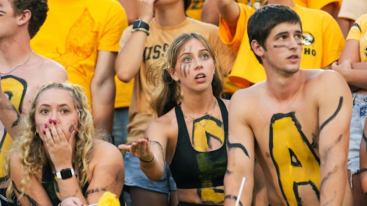 Sep 21, 2024; Columbia, Missouri, USA; Missouri Tigers fans react after a punt during the second half against the Vanderbilt Commodores at Faurot Field at Memorial Stadium. Mandatory Credit: Jay Biggerstaff-Imagn Images Sep 21, 2024; Columbia, Missouri, USA; Missouri Tigers fans react after a punt during the second half against the Vanderbilt Commodores at Faurot Field at Memorial Stadium. Mandatory Credit: Jay Biggerstaff-Imagn Images