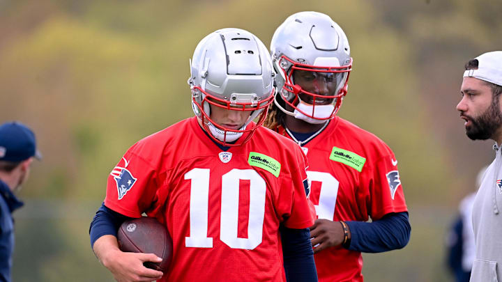 Drake Maye and New England Patriots quarterback Joe Milton III work out at the New England Patriots rookie camp Drake Maye and New England Patriots quarterback Joe Milton III work out at the New England Patriots rookie camp