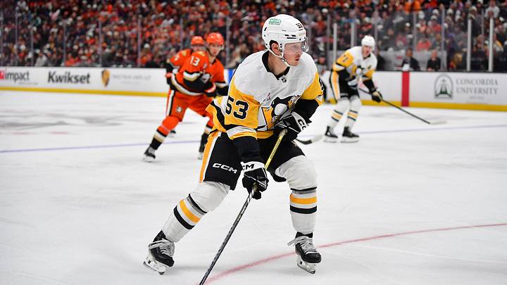 Oct 14, 2025; Anaheim, California, USA; Pittsburgh Penguins right wing Philip Tomasino (53) moves the puck against the Anaheim Ducks during the first period at Honda Center. Mandatory Credit: Gary A. Vasquez-Imagn Images