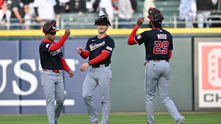 Apr 25, 2026; Chicago, Illinois, USA; Washington Nationals outfielders Daylen Like, Joey Wiemer, and James Wood (29) celebrate their victory over the Chicago White Sox at Rate Field. Mandatory Credit: Patrick Gorski-Imagn Images