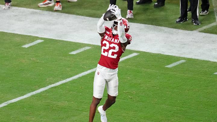 Jan 19, 2026; Miami Gardens, FL, USA; Indiana Hoosiers defensive back Jamari Sharpe (22) makes an interception against the Miami Hurricanes during the second half of the College Football Playoff National Championship game at Hard Rock Stadium. Mandatory Credit: James Lang-Imagn Images Jan 19, 2026; Miami Gardens, FL, USA; Indiana Hoosiers defensive back Jamari Sharpe (22) makes an interception against the Miami Hurricanes during the second half of the College Football Playoff National Championship game at Hard Rock Stadium. Mandatory Credit: James Lang-Imagn Images