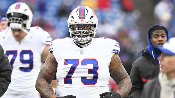 Nov 16, 2025; Orchard Park, New York, USA;  Buffalo Bills offensive tackle Dion Dawkins (73) warms up prior to the game against the Tampa Bay Buccaneers at Highmark Stadium