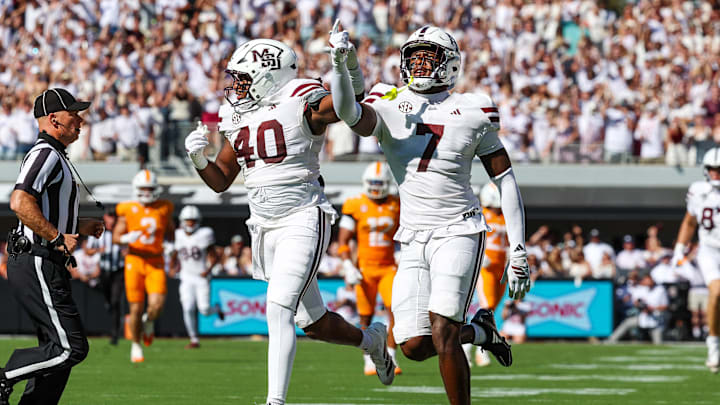 Sep 27, 2025; Starkville, Mississippi, USA; Mississippi State Bulldogs linebacker Nic Mitchell (40) and linebacker Zakari Tillman (7) react after a fumble recovery against the Tennessee Volunteers during the first half at Davis Wade Stadium at Scott Field. Mandatory Credit: Wesley Hale-Imagn Images Sep 27, 2025; Starkville, Mississippi, USA; Mississippi State Bulldogs linebacker Nic Mitchell (40) and linebacker Zakari Tillman (7) react after a fumble recovery against the Tennessee Volunteers during the first half at Davis Wade Stadium at Scott Field. Mandatory Credit: Wesley Hale-Imagn Images