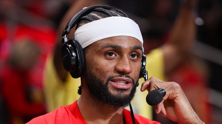 Nickeil Alexander-Walker (7) does an interview after a victory over the Milwaukee Bucks at State Farm Arena.