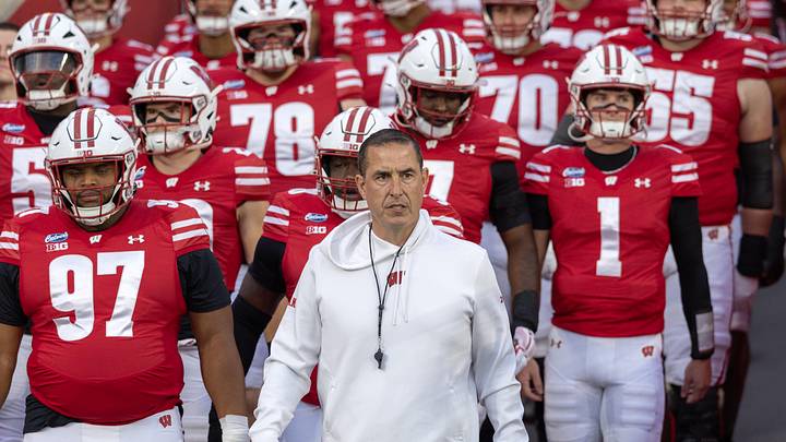 Oct 24, 2026; Madison, Wisconsin, USA;  Wisconsin Badgers head coach Luke Fickell walks onto the field with his team for warmups before the game against the USC Trojans at Camp Randall Stadium.  Mandatory Credit: Anthony Wahl-Imagn Images
