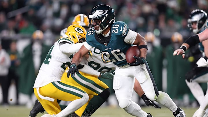 Philadelphia Eagles running back Saquon Barkley (26) rushes the ball against the Green Bay Packers in last year's playoffs.