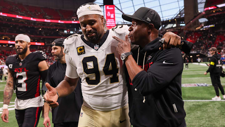 Jan 4, 2026; Atlanta, Georgia, USA; New Orleans Saints defensive end Cameron Jordan (94) walks with Atlanta Falcons head coach Raheem Morris after a game at Mercedes-Benz Stadium. Mandatory Credit: Brett Davis-Imagn Images Jan 4, 2026; Atlanta, Georgia, USA; New Orleans Saints defensive end Cameron Jordan (94) walks with Atlanta Falcons head coach Raheem Morris after a game at Mercedes-Benz Stadium. Mandatory Credit: Brett Davis-Imagn Images