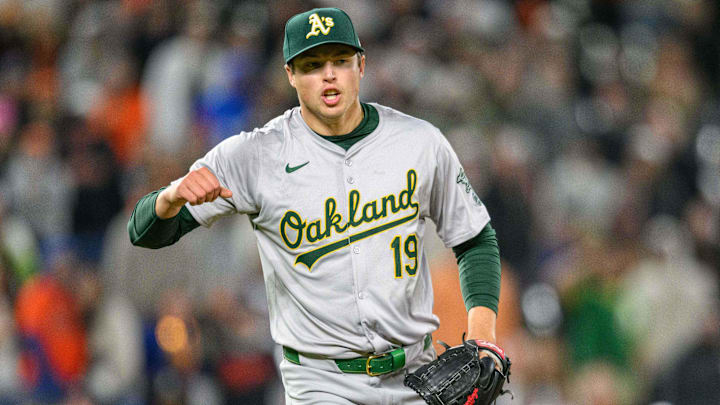 Apr 26, 2024; Baltimore, Maryland, USA; Oakland Athletics pitcher Mason Miller (19) reacts during