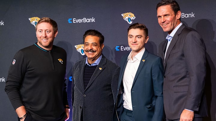 Jacksonville Jaguars Head Coach Liam Coen, left, Owner Shad Khan, second from left, new General Manager James Gladstone, second from right and Executive Vice President of Football Operations Tony Boselli, right, pose for a picture during a press conference Monday morning February 24, 2025 at the Miller Electric Center in Jacksonville, Fla. [Doug Engle/Florida Times-Union]2025