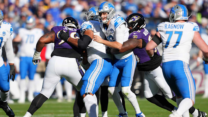 Oct 22, 2023; Baltimore, Maryland, USA; Baltimore Ravens tackle Broderick Washington (96) sacks Detroit Lions quarterback Jared Goff (16) in the fourth quarter at M&T Bank Stadium. Mandatory Credit: Mitch Stringer-Imagn Images