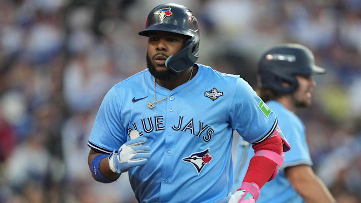 Oct 28, 2025; Los Angeles, California, USA; Toronto Blue Jays first baseman Vladimir Guerrero Jr. (27) celebrates after hitting a two run home run against the Los Angeles Dodgers in the third inning during game four of the 2025 MLB World Series at Dodger Stadium. Oct 28, 2025; Los Angeles, California, USA; Toronto Blue Jays first baseman Vladimir Guerrero Jr. (27) celebrates after hitting a two run home run against the Los Angeles Dodgers in the third inning during game four of the 2025 MLB World Series at Dodger Stadium.