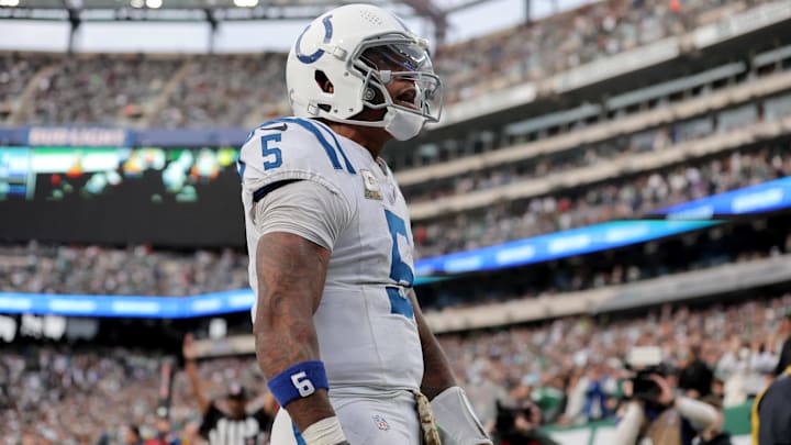 Nov 17, 2024; East Rutherford, New Jersey, USA; Indianapolis Colts quarterback Anthony Richardson (5) celebrates his touchdown against the New York Jets during the fourth quarter at MetLife Stadium. Mandatory Credit: Brad Penner-Imagn Images