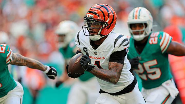 Cincinnati Bengals wide receiver Ja'Marr Chase (1) runs the ball during the first quarter against the Miami Dolphins at Hard Rock Stadium. Cincinnati Bengals wide receiver Ja'Marr Chase (1) runs the ball during the first quarter against the Miami Dolphins at Hard Rock Stadium.