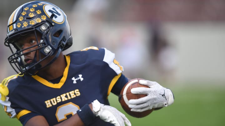 Port Huron Northern's Amir Morelan catches a pass before a game against Warren Cousino at Memorial Stadium in Port Huron on Friday, Sept. 20, 2024.