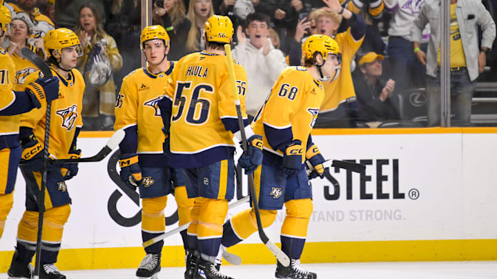 Mar 28, 2026; Nashville, Tennessee, USA;  Nashville Predators left wing Zachary L'Heureux (68) celebrates with his teammates after scoring a goal against the Montreal Canadiens during the third period Gat Bridgestone Arena. Mandatory Credit: Steve Roberts-Imagn Images