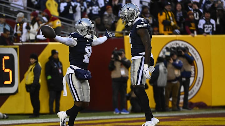Dallas Cowboys cornerback Jourdan Lewis celebrates after receiving a fumble with safety Jayron Kearse.