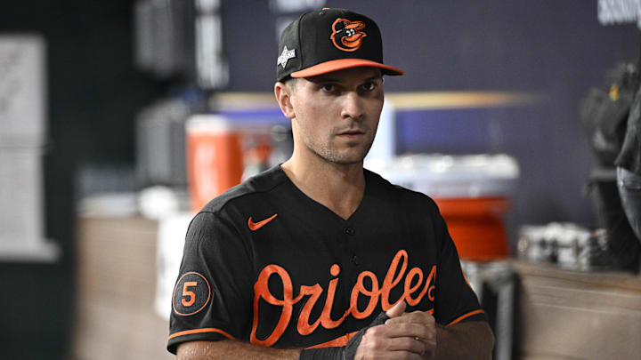 Oct 10, 2023; Arlington, Texas, USA; Baltimore Orioles second baseman Adam Frazier (12) in the dugout during warm ups before game three against the Texas Rangers in the ALDS for the 2023 MLB playoffs at Globe Life Field