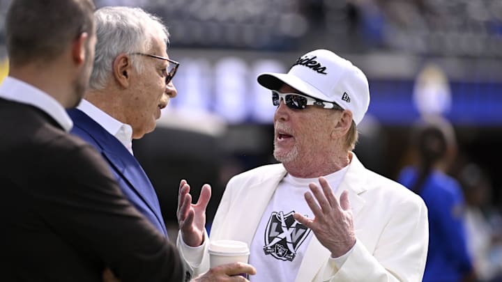 Oct 20, 2024; Inglewood, California, USA; Las Vegas Raiders owner Mark Davis, right, talks with Los Angeles Rams owner Stan Kroenke before an NFL game at SoFi Stadium. Mandatory Credit: Alex Gallardo-Imagn Images