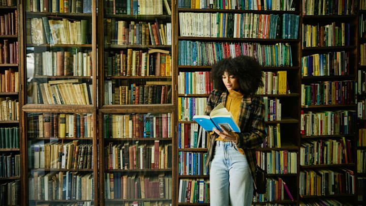 Looks like she's reading a novel, not a novella.