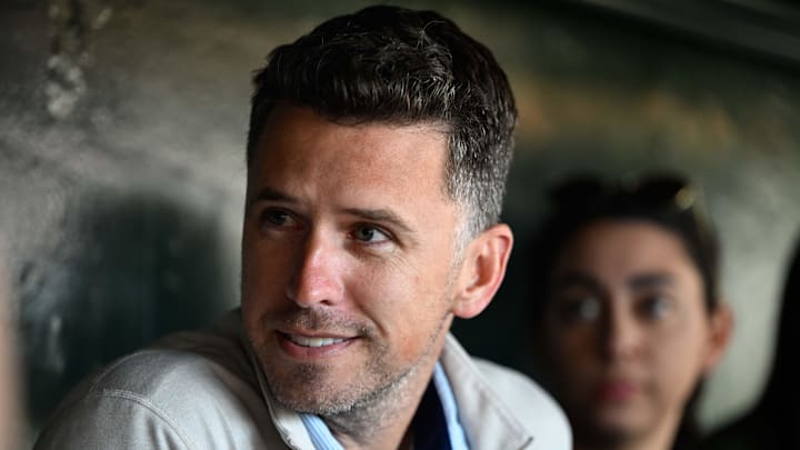 Former San Francisco Giants player Buster Posey sits in the dugout before the game against the San Diego Padres at Oracle Park. Former San Francisco Giants player Buster Posey sits in the dugout before the game against the San Diego Padres at Oracle Park.