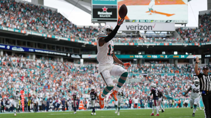 Miami Dolphins wide receiver Jaylen Waddle celebrates a touchdown against the New England Patriots Miami Dolphins wide receiver Jaylen Waddle celebrates a touchdown against the New England Patriots