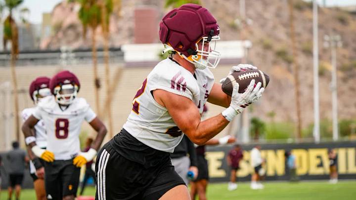 Arizona State linebacker Owen Long (22) makes an interception in a drill during a football practice in Tempe on Aug. 5, 2026. Arizona State linebacker Owen Long (22) makes an interception in a drill during a football practice in Tempe on Aug. 5, 2026.
