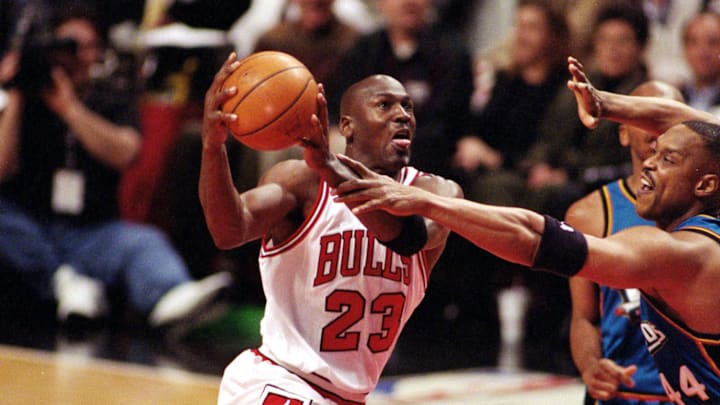 Apr 8, 1998; Chicago, IL, USA; Chicago Bulls guard Michael Jordan (23), left, takes off for the basket in front of Detroit Pistons player Rick Mahorn (44), right at the United Center. Mandatory Credit: Anne Ryan-USA TODAY Apr 8, 1998; Chicago, IL, USA; Chicago Bulls guard Michael Jordan (23), left, takes off for the basket in front of Detroit Pistons player Rick Mahorn (44), right at the United Center. Mandatory Credit: Anne Ryan-USA TODAY