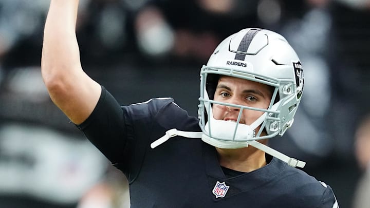 Jan 7, 2024; Paradise, Nevada, USA; Las Vegas Raiders quarterback Aidan O'Connell (4) warms up