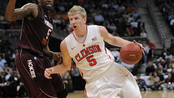Mar 8, 2012; Atlanta, GA, USA; Clemson Tigers guard Tanner Smith (5) drives to the basket past Virginia Tech Hokies guard Dorenzo Hudson (5) (left) in the second half during the first round of the 2012 ACC Men's Basketball Tournament at Philips Arena. Mandatory Credit: Bob Donnan-Imagn Images Mar 8, 2012; Atlanta, GA, USA; Clemson Tigers guard Tanner Smith (5) drives to the basket past Virginia Tech Hokies guard Dorenzo Hudson (5) (left) in the second half during the first round of the 2012 ACC Men's Basketball Tournament at Philips Arena. Mandatory Credit: Bob Donnan-Imagn Images