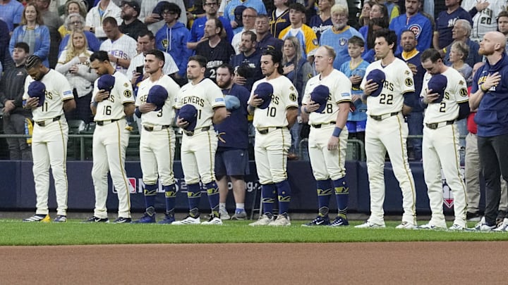 Oct 11, 2025; Milwaukee, Wisconsin, USA; Milwaukee Brewers players line up for the national anthem before game five against the Chicago Cubs in the NLDS round for the 2025 MLB playoffs at American Family Field. Mandatory Credit: Michael McLoone-Imagn Images Oct 11, 2025; Milwaukee, Wisconsin, USA; Milwaukee Brewers players line up for the national anthem before game five against the Chicago Cubs in the NLDS round for the 2025 MLB playoffs at American Family Field. Mandatory Credit: Michael McLoone-Imagn Images