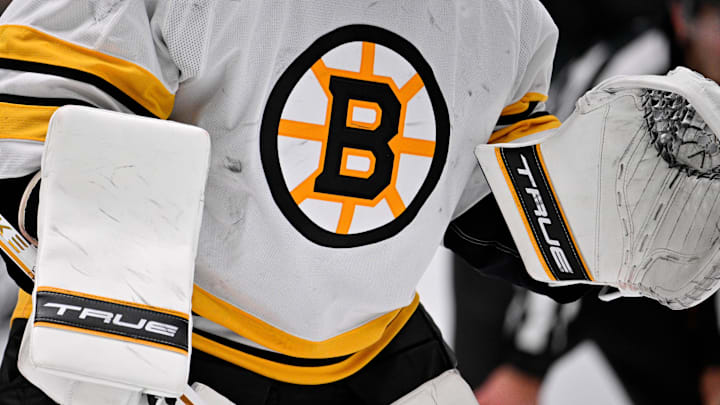 Jan 20, 2026; Dallas, Texas, USA;  A view of the Boston Bruins logo on the jersey of Boston Bruins goaltender Jeremy Swayman (1) during the game at the American Airlines Center. Mandatory Credit: Jerome Miron-Imagn Images