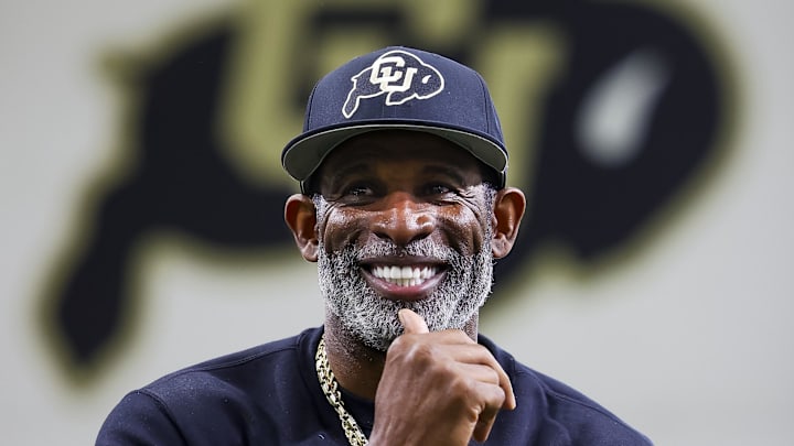 Apr 4, 2025; Boulder, CO, USA; Colorado Buffaloes head coach Deion Sanders watches as his players go through drills at the University of Colorado NFL Showcase at the CU Indoor Practice Facility. 