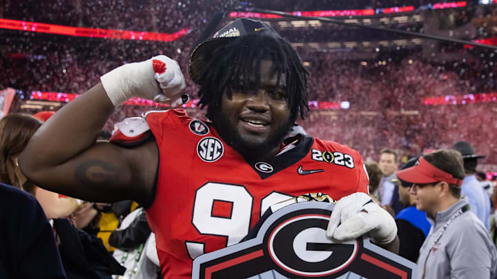Jan 9, 2023; Inglewood, CA, USA; Georgia Bulldogs defensive lineman Bear Alexander (99) celebrates after defeating the TCU Horned Frogs during the CFP national championship game at SoFi Stadium. Mandatory Credit: Mark J. Rebilas-Imagn Images Jan 9, 2023; Inglewood, CA, USA; Georgia Bulldogs defensive lineman Bear Alexander (99) celebrates after defeating the TCU Horned Frogs during the CFP national championship game at SoFi Stadium. Mandatory Credit: Mark J. Rebilas-Imagn Images
