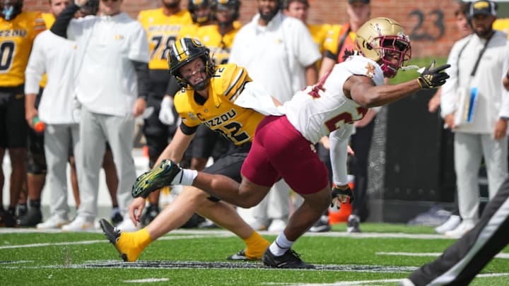 Sep 14, 2024; Columbia, Missouri, USA; Boston College Eagles cornerback Amari Jackson (24) tips a pass from Missouri Tigers quarterback Brady Cook (12) during the first half at Faurot Field at Memorial Stadium. Mandatory Credit: Denny Medley-Imagn Images Sep 14, 2024; Columbia, Missouri, USA; Boston College Eagles cornerback Amari Jackson (24) tips a pass from Missouri Tigers quarterback Brady Cook (12) during the first half at Faurot Field at Memorial Stadium. Mandatory Credit: Denny Medley-Imagn Images